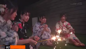 4 friends enjoy sparklers