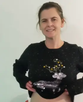 Average mom showing her Christmas sweater puppies [drop]