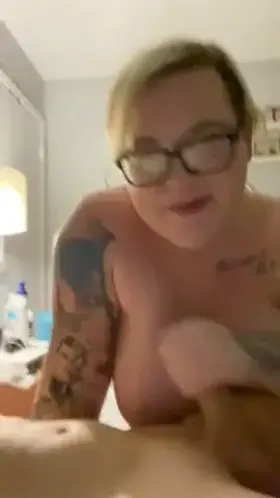 Sexy blonde gives a sloppy handjob