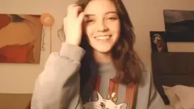 Cute teen reveals small tits