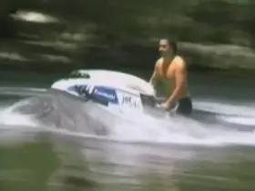 Drug lord Pablo Escobar riding a jet ski