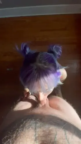 A happy girl with a cock in her throat