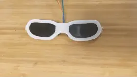 [WIP] After kind of forgetting about it for over a year, I've picked up my remote-controlled blindfold project again! I modelled and 3D-printed a set of frames which aren't scavenged from old 3D glasses for a change! Previous posts in comments.