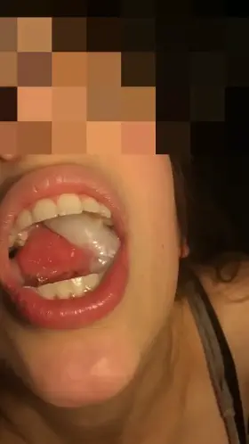 A slow motion of me playing with cum before swallowing