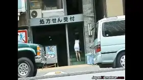 Japanese Girl Giving A Blowjob In Front Of A Building Entrance