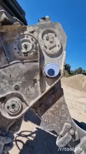 Rock crusher with a googly eye
