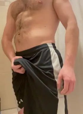 Stroking my cock and flexing for you