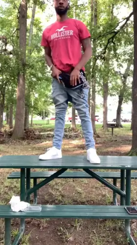 Standing in the middle of the park stroking this DICK...