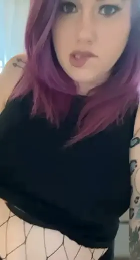 Tattoos, fishnets, studded shoes, leather bra, married and open! 😉