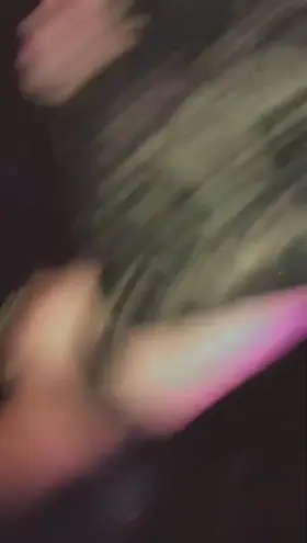 Unzipping my dress in the nightclub.