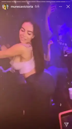 Her dancing while her titties coming out her shirt