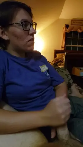 Stroking my cock while watching TV