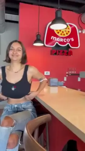 At the pizzeria she shows her tits