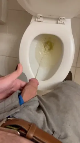 Veiny cock pissing before work