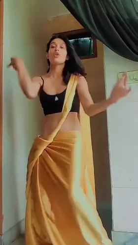 Anjali kapoor showing off her sexy navel in satin saree - sports bra combo