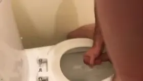 Cuming into a toilet
