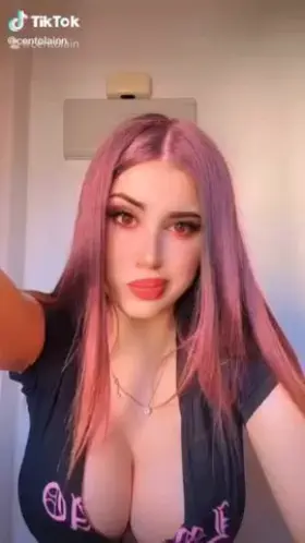 Big tits can’t hide the heartache in her eyes. (NSFW)