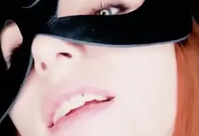 Masked vixen gets a huge facial after a sensual blowjob