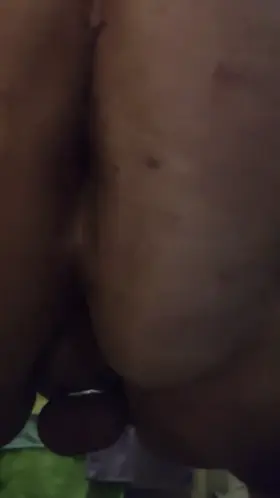 Fat sissy in chastity pushing one out