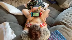 Trying to distract her while she plays on her switch.