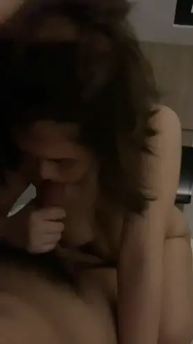 Sucking friend's cock at a hotel