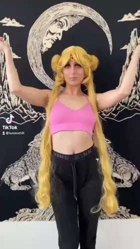 Sailor Moon playing with her wand