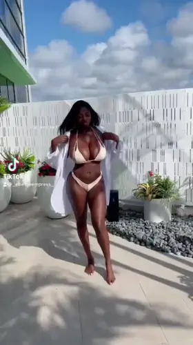 Big tits jiggling as she walks