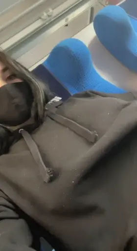 Showed her boobs next to a stranger in the train