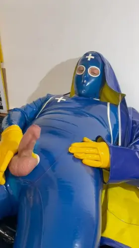 Dressed in blue latex catsuit and yellow gloves pressing the balls just ended in a cum explosion 💦[M]