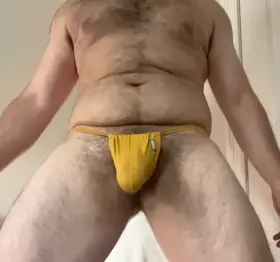 Having some fun flopping my bulge all over the place in this pocket string bikini 😜