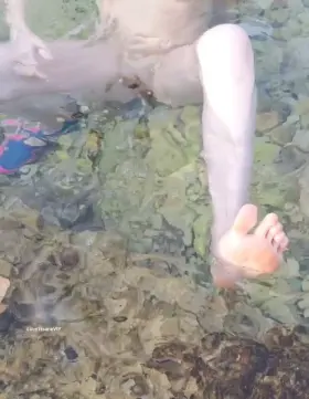 Some underwater fun on a public beach.