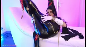Bayonetta cosplayer rides cock sucks dildo gets cum shows off big tits