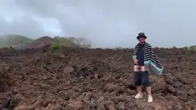 swinging on top of a volcano