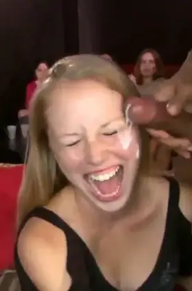Amazing party girl happily taking her facial