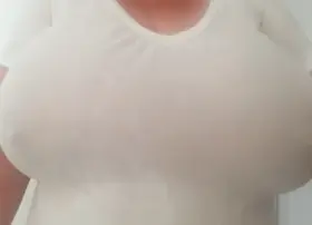 Shirt's damp, enough to show a nipple clamp 😈