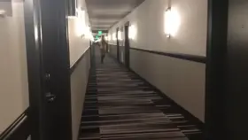 Naked in the hotel hallway