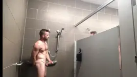 Putting on a show for his gym shower bro