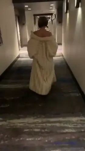 Jada's hotel corridor walk