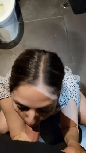 Blowing him in the men's room like a good little slut