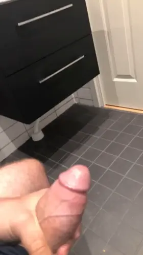 My cock erupting in my bathroom....