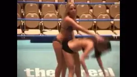 Ringside girls dry humping in the middle of the ring