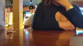 Asian pulling out a hooter at Hooters