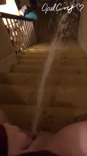 Spraying powerful pee fountains down the stairs