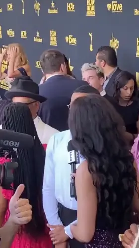 Walking across a red carpet