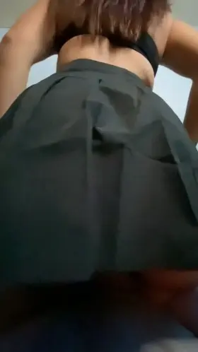 Cute ass in mini skirt