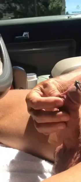 Driving home, roof open, warm, sunny and naked a penis plug and a big gape ...... what a day.