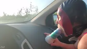 Wearing my latex mask as I take my mystic dildo out for a car ride.