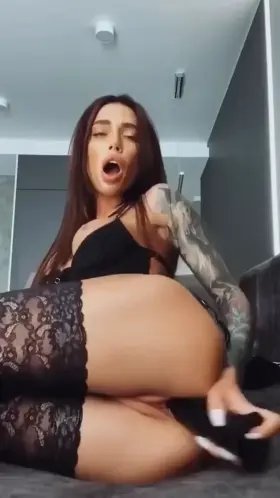 Passionate Russian beauty plays with with a big black dildo. Hope you like