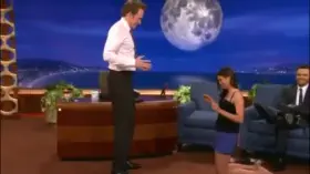 Nina Dobrev uses Conan as her yoga wall