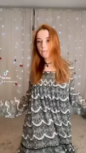 Dancing her clothes away
